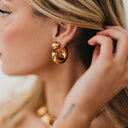 Caroline Reversible Hoop Chunky Earrings in gold.