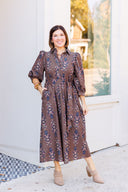 Dark brown floral dress maxi dress with pockets and matching sash.