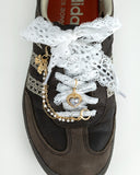 White lace shoes laces with pearl and gold chain and charms.
