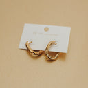 Flirty Fantasy Oval Hoop Earrings in gold.