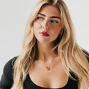 Mini Open Oval Pendant Necklace in gold.