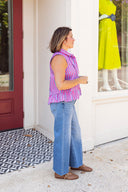 The Capri Stripe Peplum Top Entro
