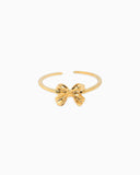 Gold bow-shaped adjustable ring.