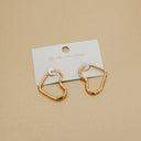 Love On My Mind Heart Hoop Earrings in gold.